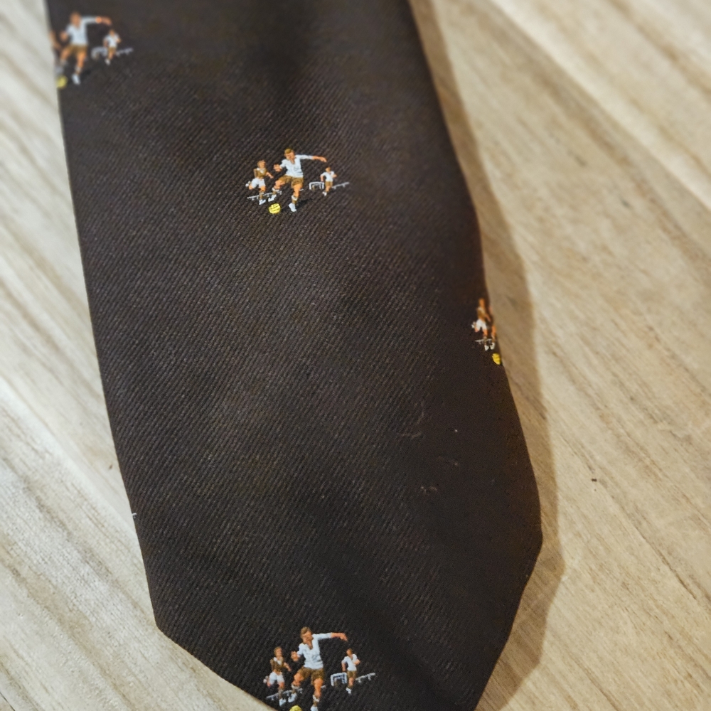 Football Or Soccer? Black Men's Tie with Soccer Player Motif